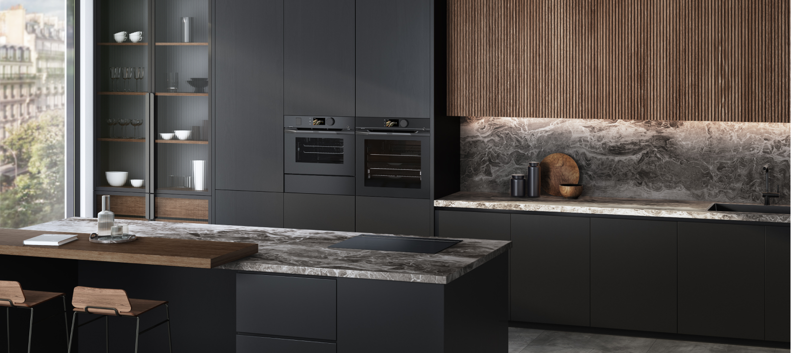 Stimmungsbild der Farbe Infinite Black, das eine Küche mit Elektrogeräten von De Dietrich zeigt.